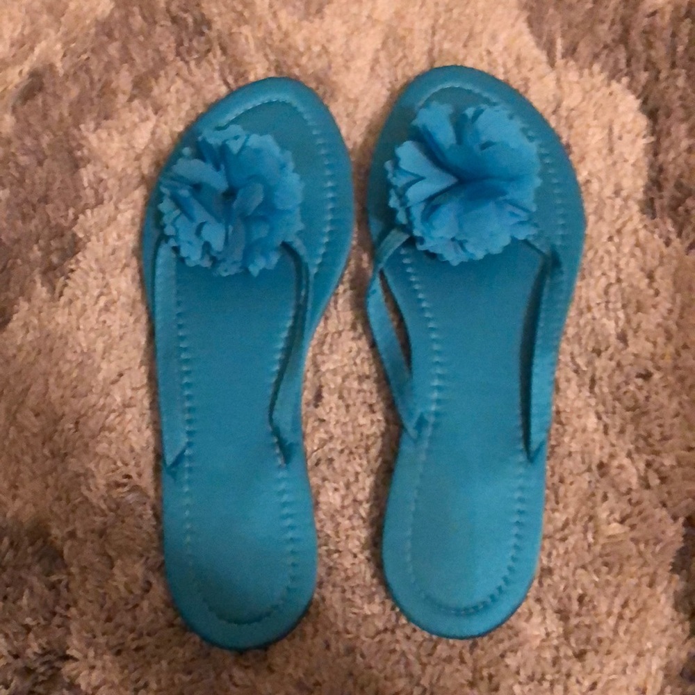 Aqua blue flip flops